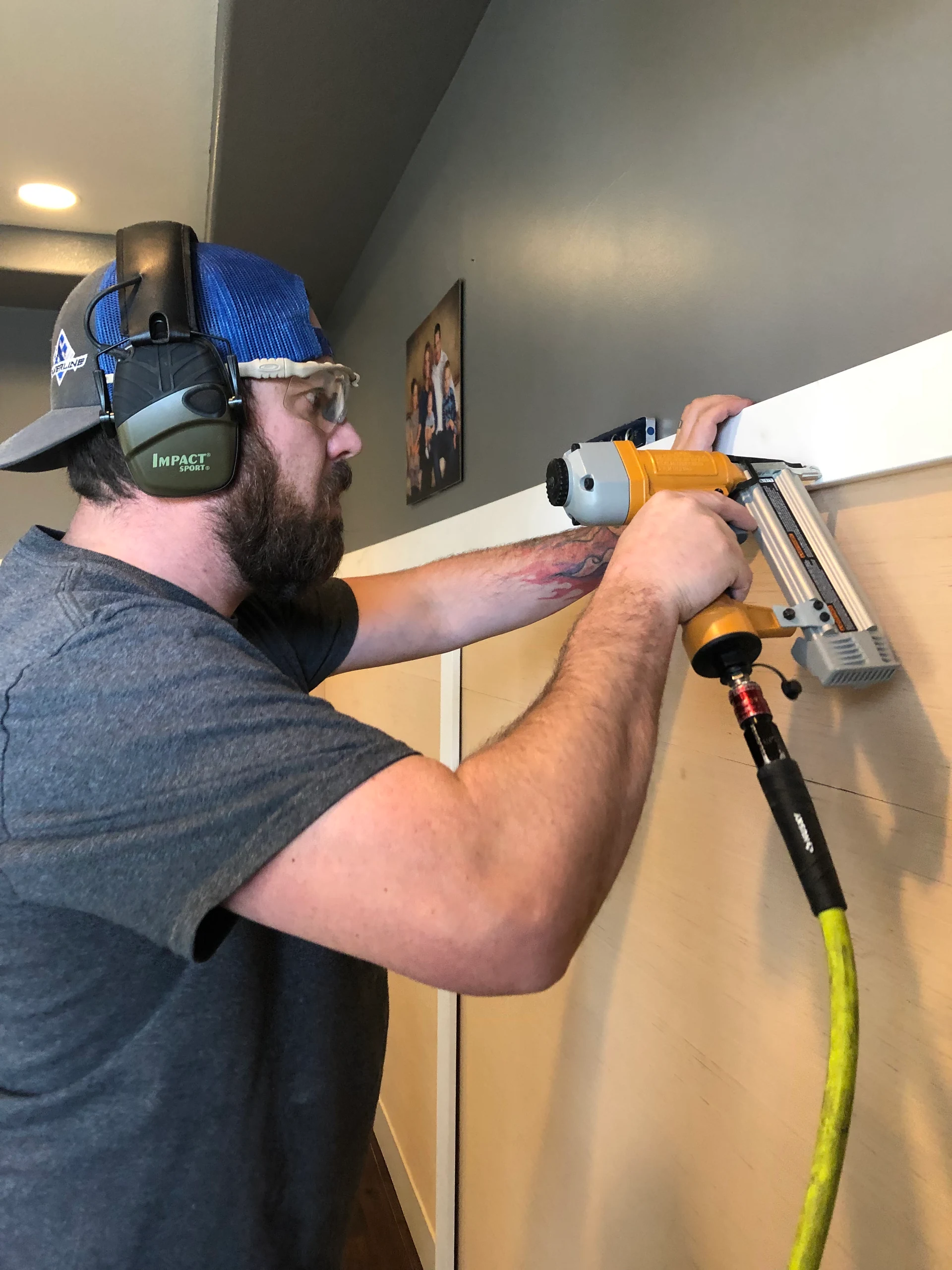 Justin installing wainscoting